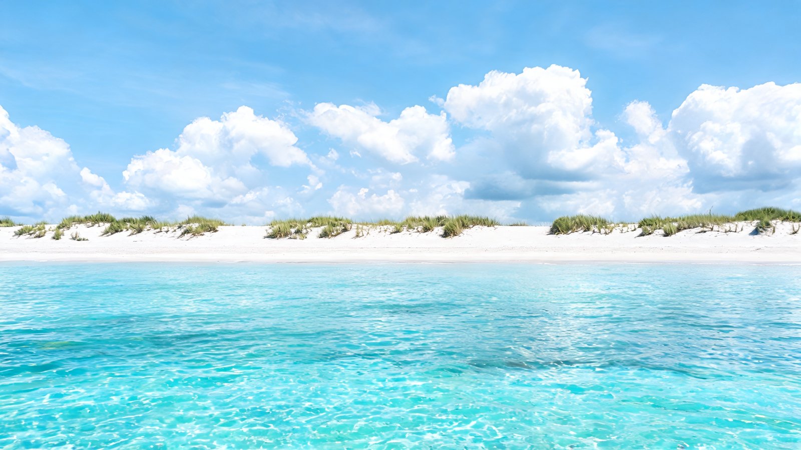 Clear shallow water at the waterline off the powder sand of Grace Bay, Turks and Caicos