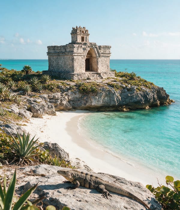 The clifftop Maya temple at Tulum above a turquoise cove, an iguana on sun-warmed stone