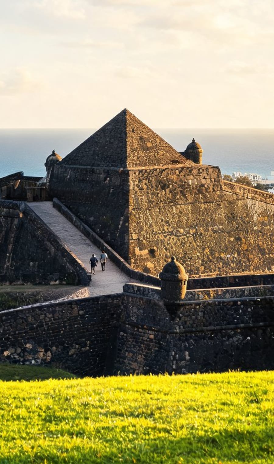 The stone ramparts of Cartagena's walled city in late afternoon light
